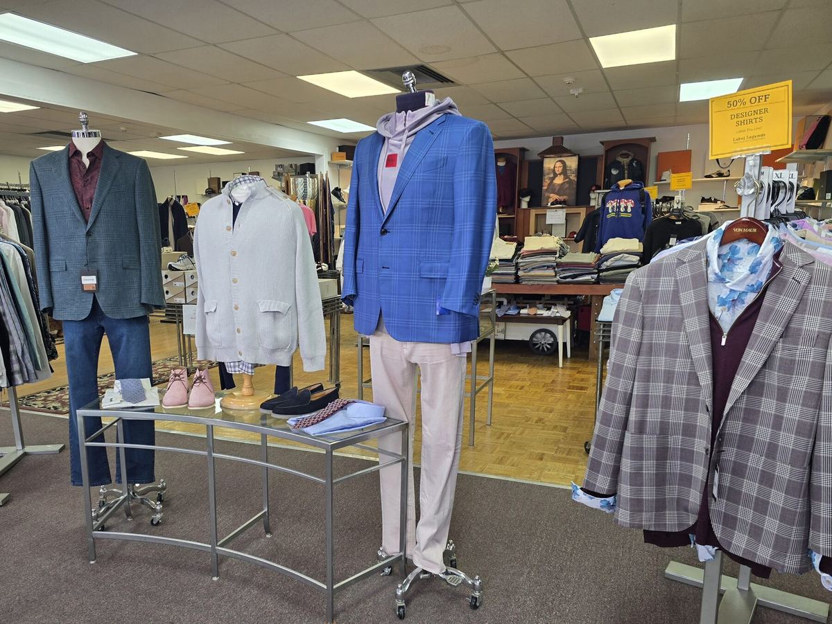 Suits and sport coats on mannequins in the Label Legends showroom