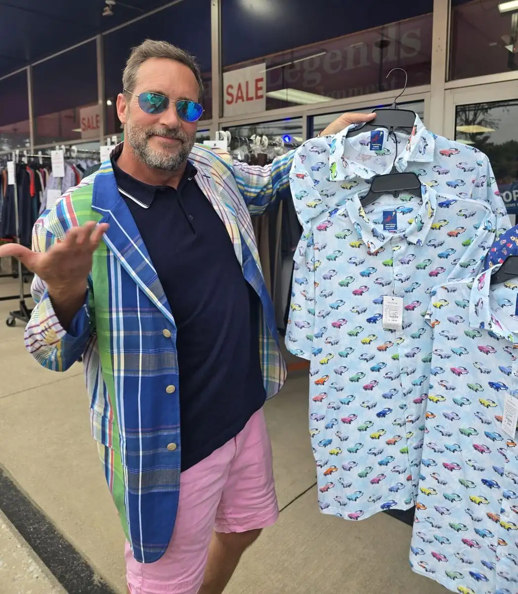 Mike showing designer shirts outside the Label Legends showroom