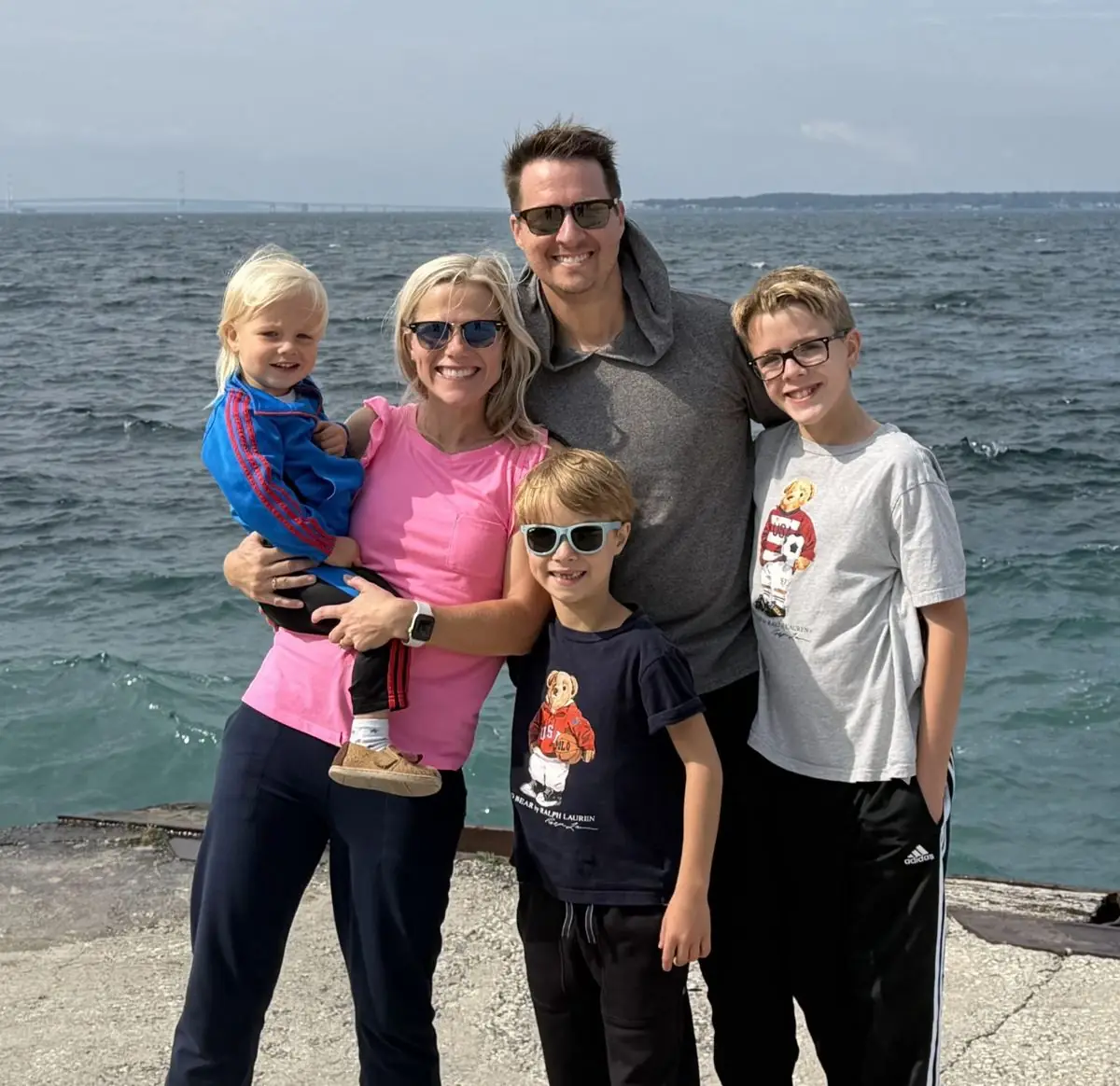 Evan and his family on the Lake Michigan shoreline