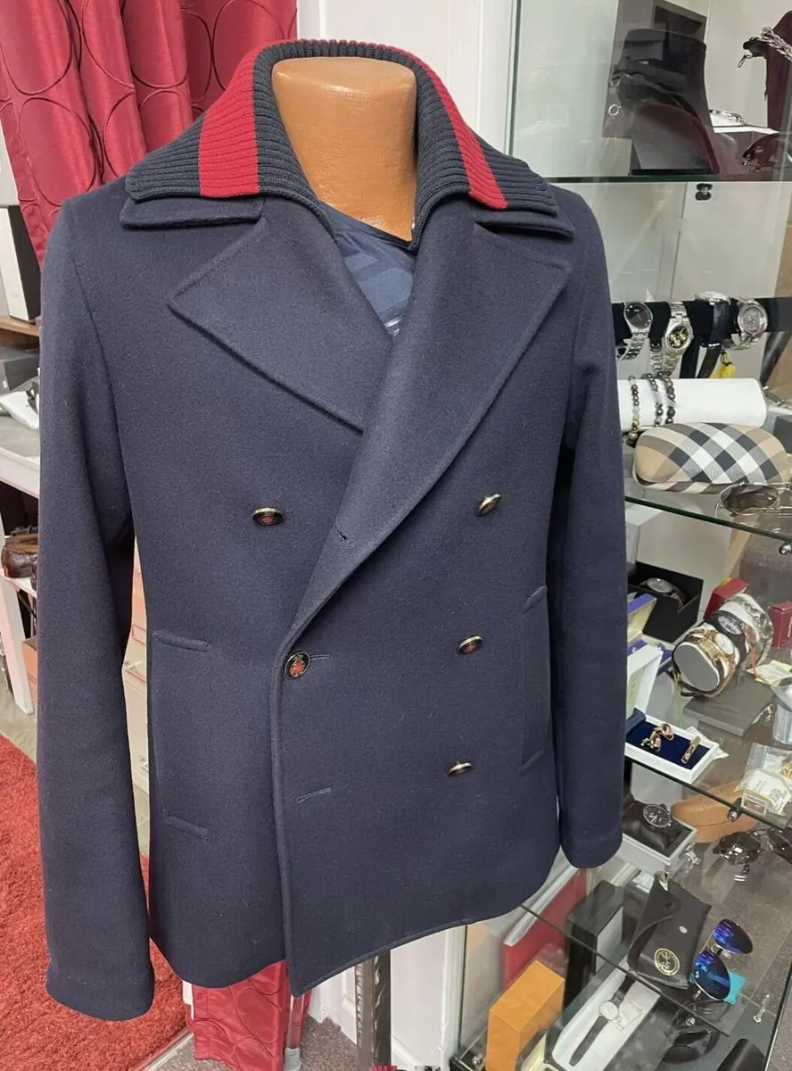 Navy wool double-breasted peacoat with red knit collar at Label Legends
