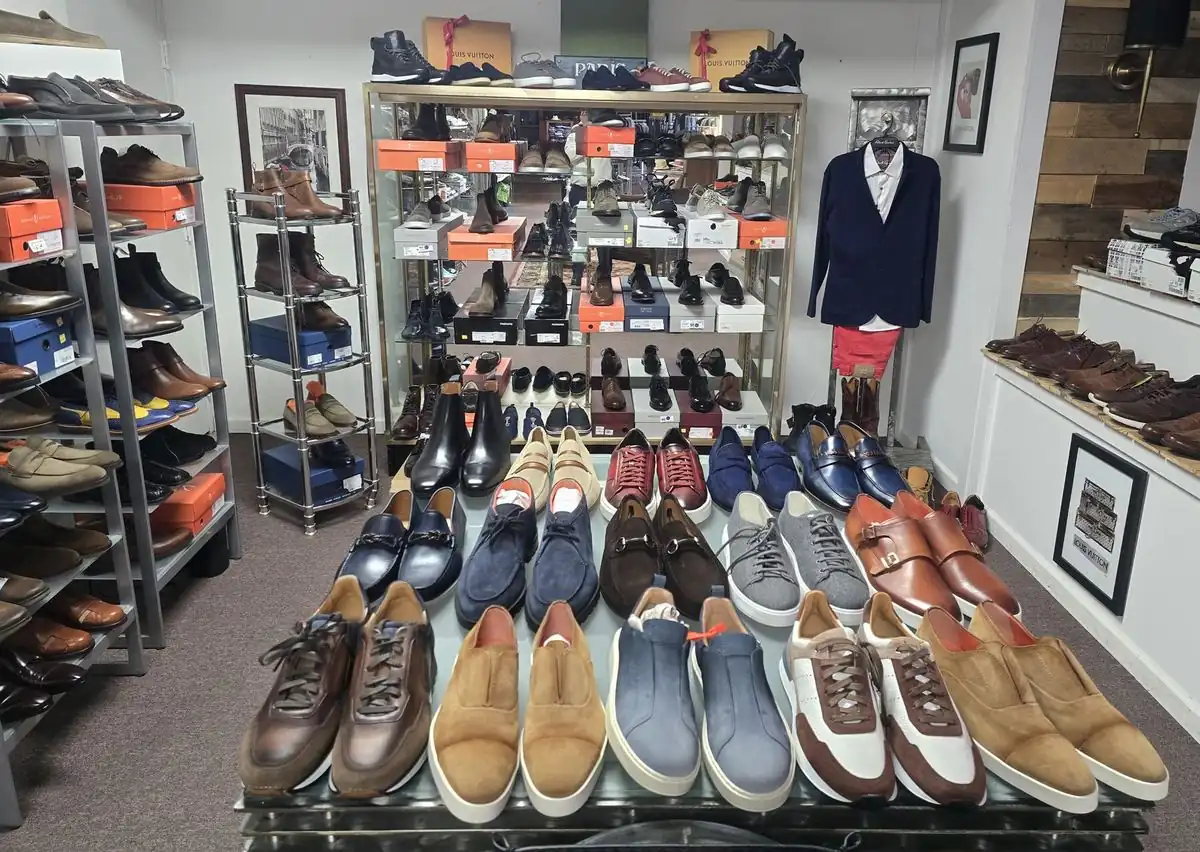 Rows of designer dress shoes, loafers and sneakers on display in the Label Legends showroom