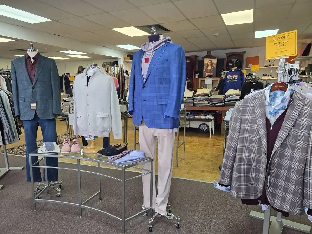 Suits and sport coats on mannequins in the Label Legends showroom